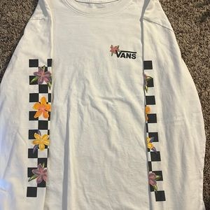 This is a white vans shirt, size M, with great quality.